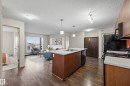 309 508 Albany Way, Edmonton, AB  - Indoor Photo Showing Kitchen With Double Sink 