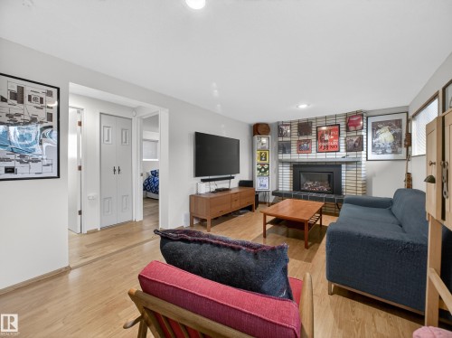 11008 40 Avenue, Edmonton, AB - Indoor Photo Showing Living Room With Fireplace
