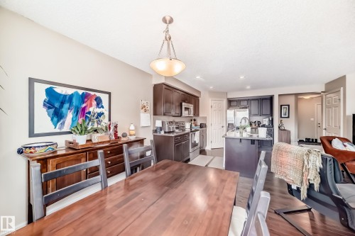 Dining room featuring light wood-type flooring and recessed lighting - 9645 Simpson Place, Edmonton, AB 