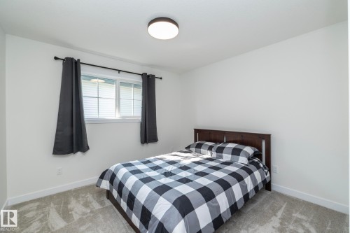 56 Brazeau Drive, Devon, AB - Indoor Photo Showing Bedroom