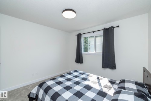 56 Brazeau Drive, Devon, AB - Indoor Photo Showing Bedroom