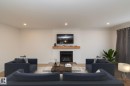 56 Brazeau Drive, Devon, AB  - Indoor Photo Showing Living Room With Fireplace 