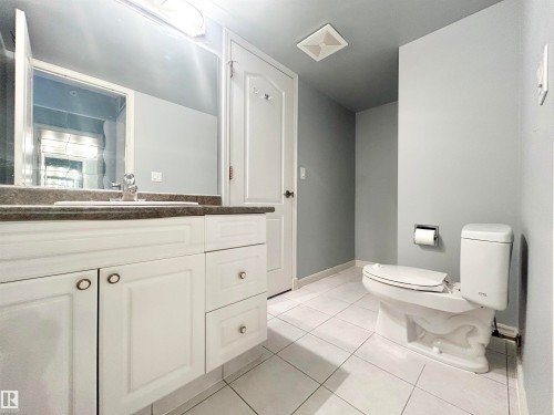 Bathroom with light tile patterned floors and vanity - 1402 10909 103 Avenue, Edmonton, AB - Indoor Photo Showing Bathroom