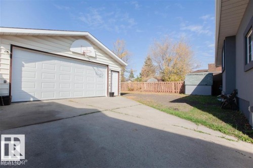 Detached garage featuring a shed - 17208 106 Street, Edmonton, AB - Outdoor With Exterior