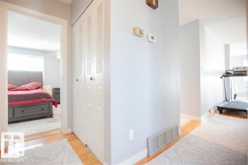 Hallway featuring light wood-style flooring - 17208 106 Street, Edmonton, AB - Indoor