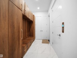Mudroom with light marble finish floors - 