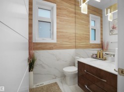 Bathroom featuring vanity, tile walls, and light marble finish flooring - 