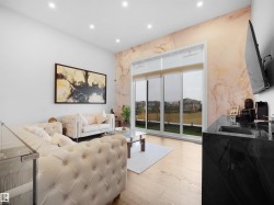 Living area featuring recessed lighting and light wood-style flooring - 