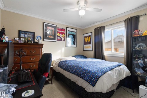 Bedroom featuring crown molding and ceiling fan - 4423 18 Avenue, Edmonton, AB - Indoor Photo Showing Bedroom