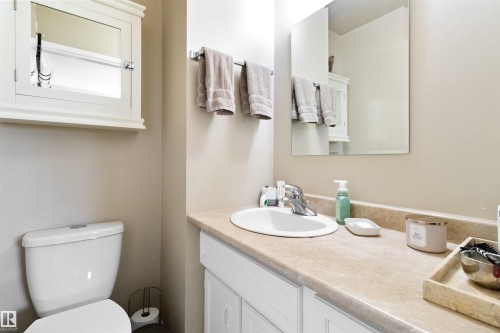 Bathroom with vanity and toilet - 4423 18 Avenue, Edmonton, AB - Indoor Photo Showing Bathroom