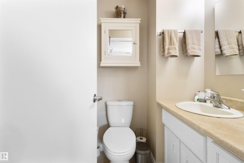 Bathroom with vanity and toilet - 4423 18 Avenue, Edmonton, AB - Indoor Photo Showing Bathroom
