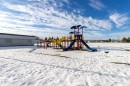 View of snow covered playground - 4423 18 Avenue, Edmonton, AB  - Outdoor With View 