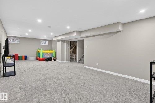 Recreation room featuring carpet flooring and recessed lighting - 5 Langley Drive, Fort Saskatchewan, AB - Indoor Photo Showing Basement