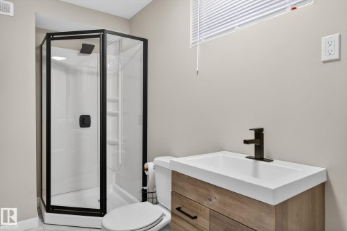 Bathroom featuring a shower stall and vanity - 5 Langley Drive, Fort Saskatchewan, AB - Indoor Photo Showing Bathroom