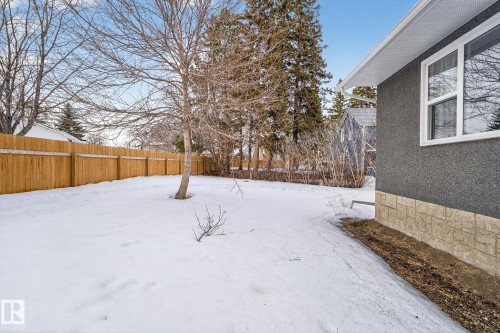 Snowy yard featuring a fenced backyard - 5 Langley Drive, Fort Saskatchewan, AB - Outdoor