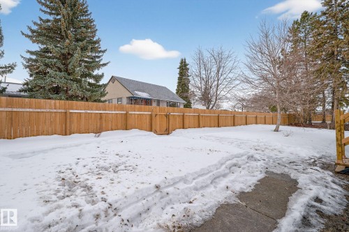 Snowy yard with a fenced backyard - 5 Langley Drive, Fort Saskatchewan, AB - Outdoor