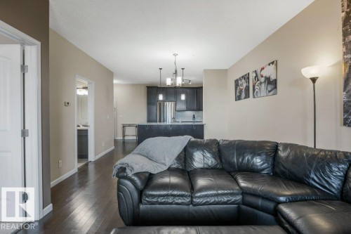 217 6083 Maynard Way, Edmonton, AB - Indoor Photo Showing Living Room