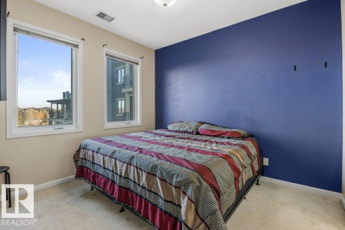 217 6083 Maynard Way, Edmonton, AB - Indoor Photo Showing Bedroom