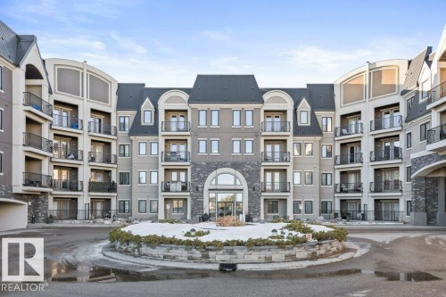 217 6083 Maynard Way, Edmonton, AB - Outdoor With Balcony With Facade