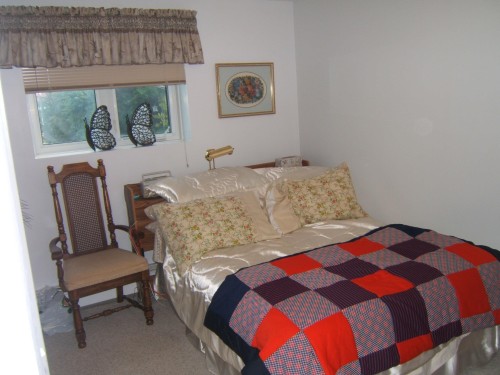 Bedroom with carpet - 4807 54 Avenue, Two Hills, AB - Indoor Photo Showing Bedroom