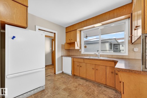 11428 51 Avenue, Edmonton, AB - Indoor Photo Showing Kitchen With Double Sink