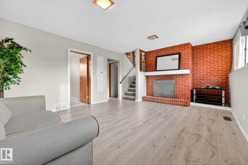 11428 51 Avenue, Edmonton, AB - Indoor Photo Showing Living Room With Fireplace