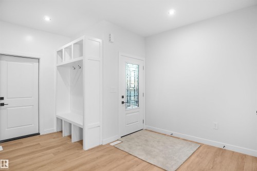 Mudroom featuring light wood finished floors and recessed lighting - 6228 29 Avenue, Edmonton, AB - Indoor Photo Showing Other Room