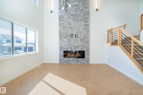 119 Lilac Close, Leduc, AB - Indoor Photo Showing Living Room With Fireplace