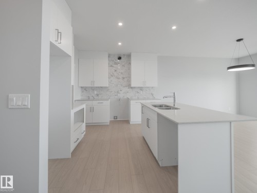 17624 4 Street, Edmonton, AB - Indoor Photo Showing Kitchen With Double Sink
