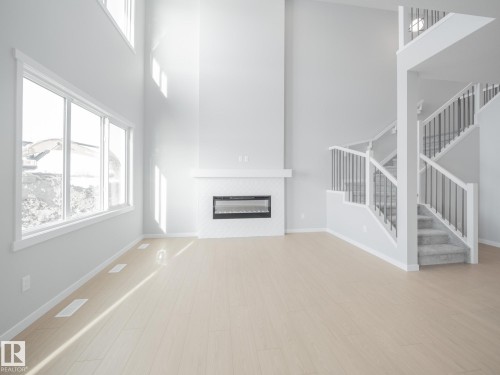 17624 4 Street, Edmonton, AB - Indoor Photo Showing Other Room With Fireplace