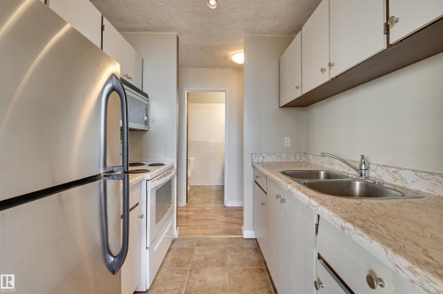 1304 13910 Stony Plain Road, Edmonton, AB - Indoor Photo Showing Kitchen With Double Sink