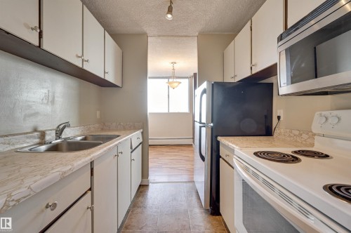1304 13910 Stony Plain Road, Edmonton, AB - Indoor Photo Showing Kitchen With Double Sink