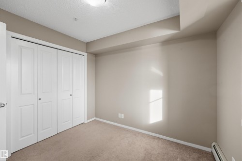 208 5810 Mullen Place, Edmonton, AB - Indoor Photo Showing Other Room