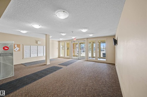 208 5810 Mullen Place, Edmonton, AB - Indoor Photo Showing Other Room