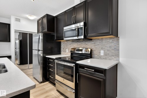 318 1144 Adamson Drive, Edmonton, AB - Indoor Photo Showing Kitchen With Stainless Steel Kitchen With Double Sink With Upgraded Kitchen