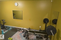 Exercise room featuring baseboards - 