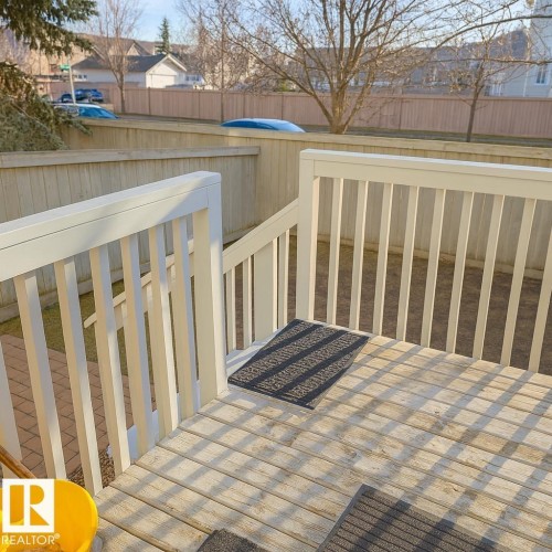 View of wooden deck - 4 4350 23 Street, Edmonton, AB - Outdoor With Deck Patio Veranda
