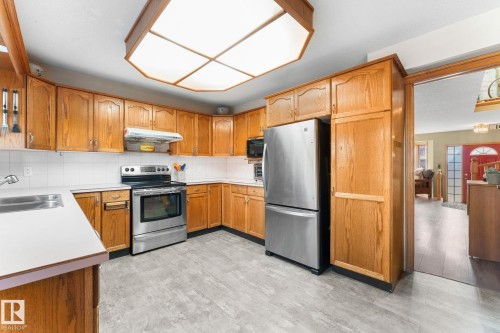 6018 156 Avenue, Edmonton, AB - Indoor Photo Showing Kitchen With Double Sink