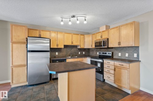 408 2098 Blackmud Creek Drive, Edmonton, AB - Indoor Photo Showing Kitchen With Double Sink