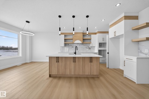 459 Crystal Creek Link, Leduc, AB - Indoor Photo Showing Kitchen With Upgraded Kitchen