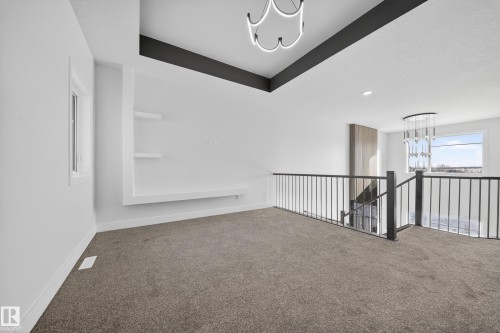 459 Crystal Creek Link, Leduc, AB - Indoor Photo Showing Other Room