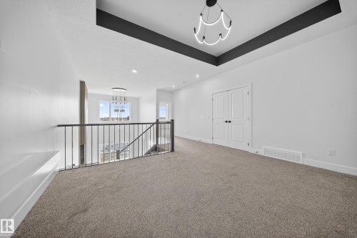 459 Crystal Creek Link, Leduc, AB - Indoor Photo Showing Other Room