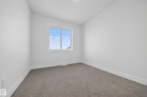 459 Crystal Creek Link, Leduc, AB - Indoor Photo Showing Other Room