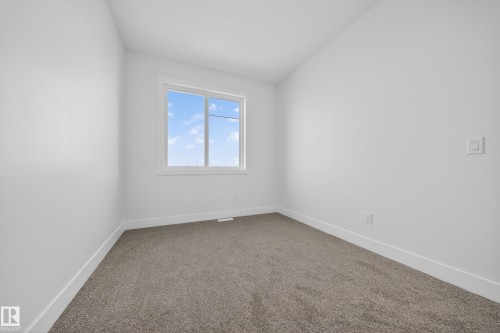 459 Crystal Creek Link, Leduc, AB - Indoor Photo Showing Other Room