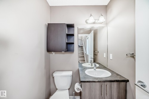 Bathroom featuring toilet and vanity - 9332 211 Street Nw, Edmonton, AB - Indoor Photo Showing Bathroom