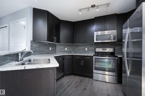 7155 Cardinal Way, Edmonton, AB - Indoor Photo Showing Kitchen With Double Sink
