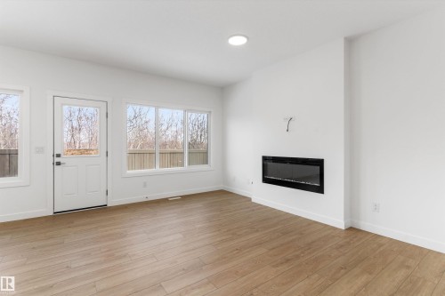 8716 183 Avenue, Edmonton, AB - Indoor Photo Showing Living Room With Fireplace