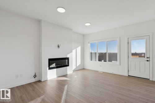 18923 28 Avenue, Edmonton, AB - Indoor Photo Showing Living Room With Fireplace