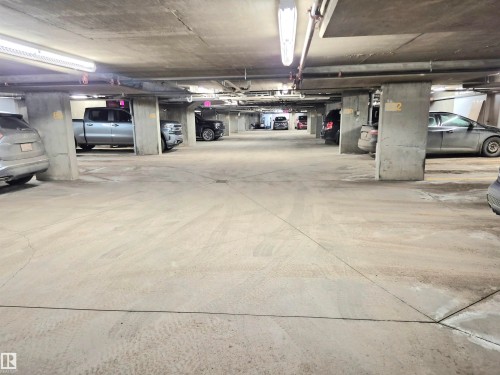 View of parking deck - 203 5390 Chappelle Road Sw, Edmonton, AB - Indoor Photo Showing Garage