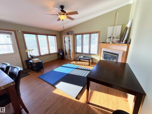 28 52327 Rge Road 20, Rural Parkland County, AB - Indoor Photo Showing Living Room With Fireplace